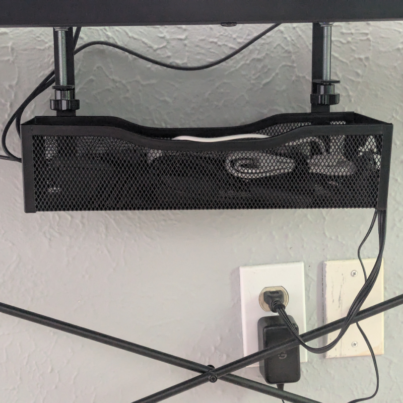 Desk cable management basket